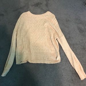 A drop shoulder sweater